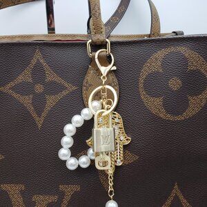 Authentic Louis Vuitton Lock & Key with Unbranded Evil Eye Charm, Keychain